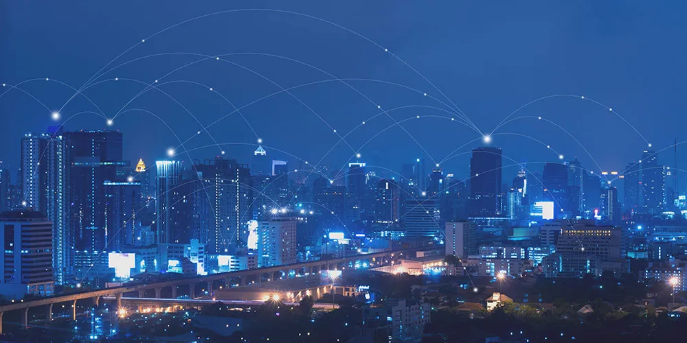 rock-solid-connection view of a city at night with internet connections