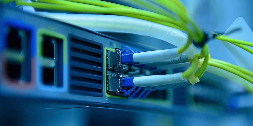 fibre-connectivity Fibre cable plugged into a switch