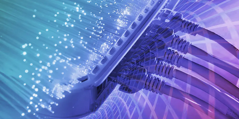 ethernet_connection fibre strands merging into a network switch